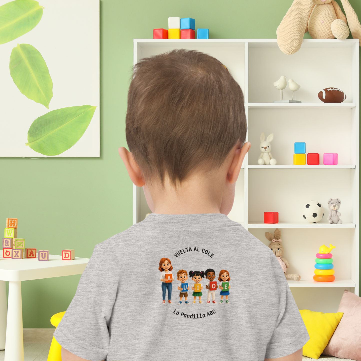 Camiseta educativa infantil Las vocales vuelven al cole